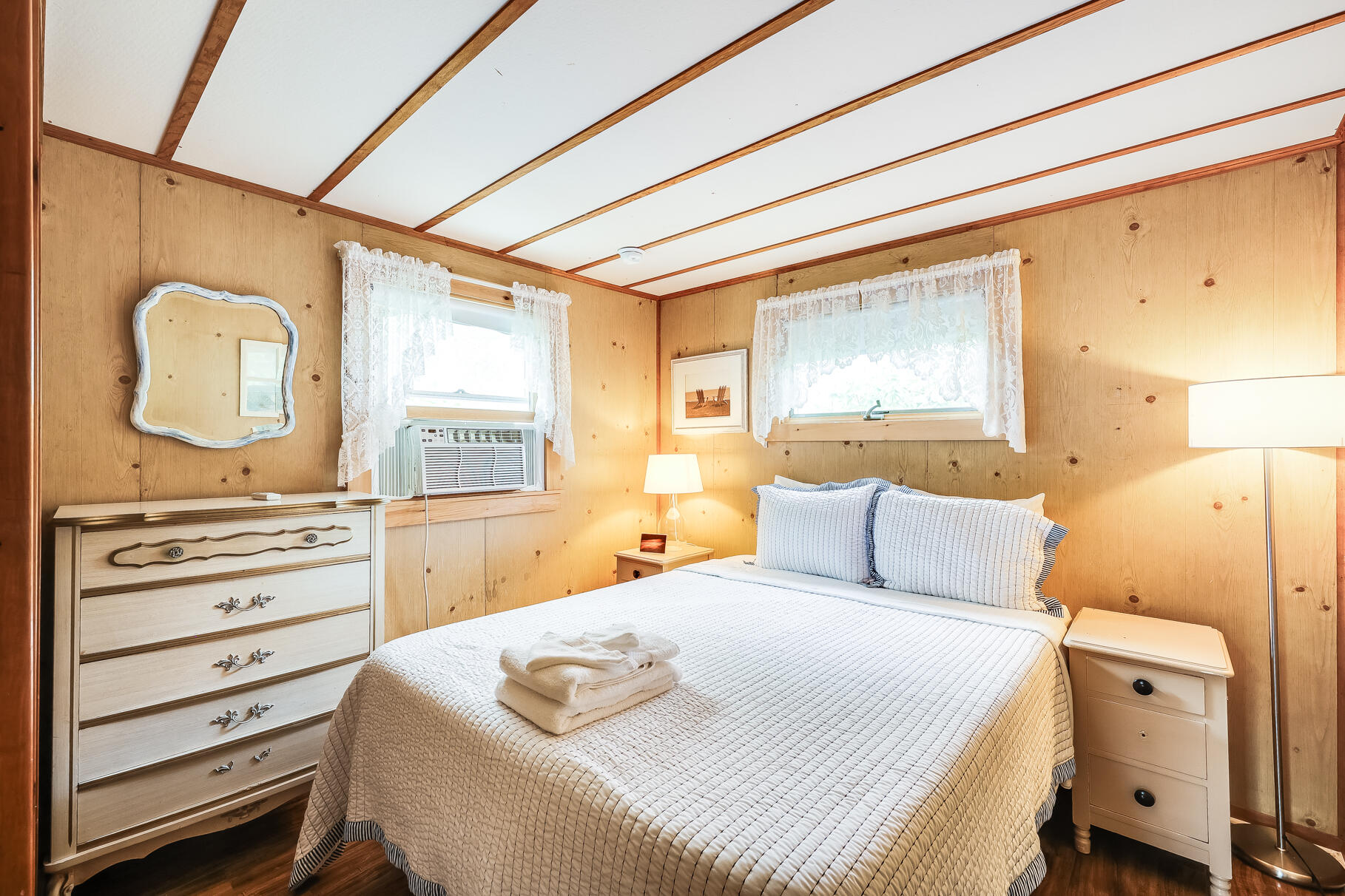 85 Boreen Road Eastham, MA 02642 - Photo 52 of 73 a bedroom with a bed and a dresser