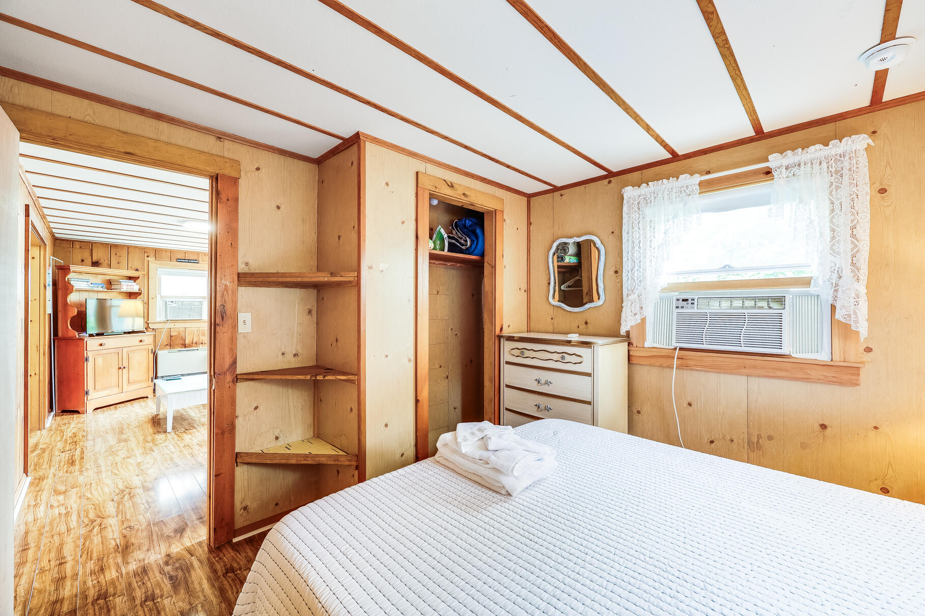 85 Boreen Road Eastham, MA 02642 - Photo 53 of 73 a bedroom with a bed and wooden floor