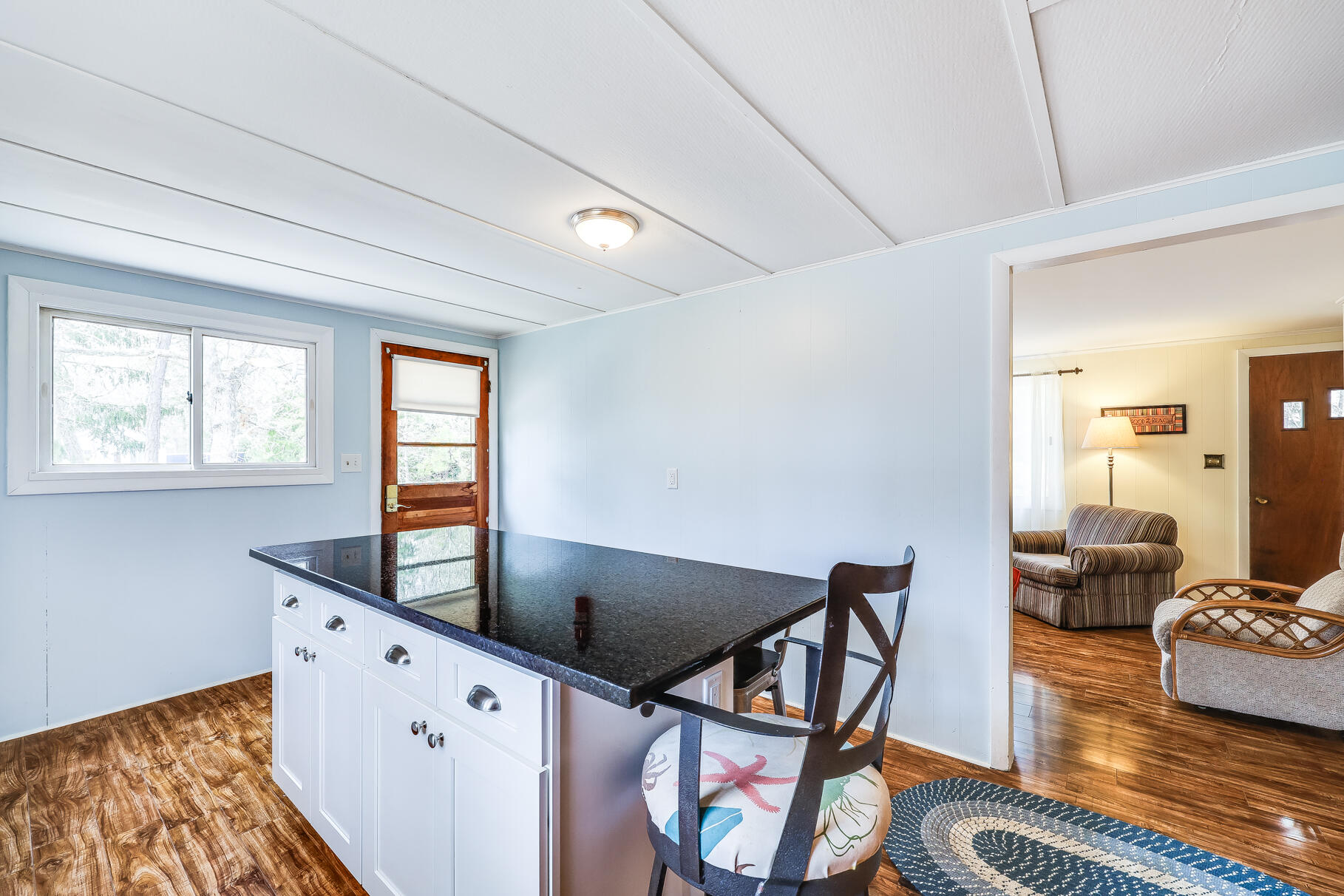 85 Boreen Road Eastham, MA 02642 - Photo 6 of 73 a kitchen with stainless steel appliances kitchen island granite countertop a sink and a granite counter tops