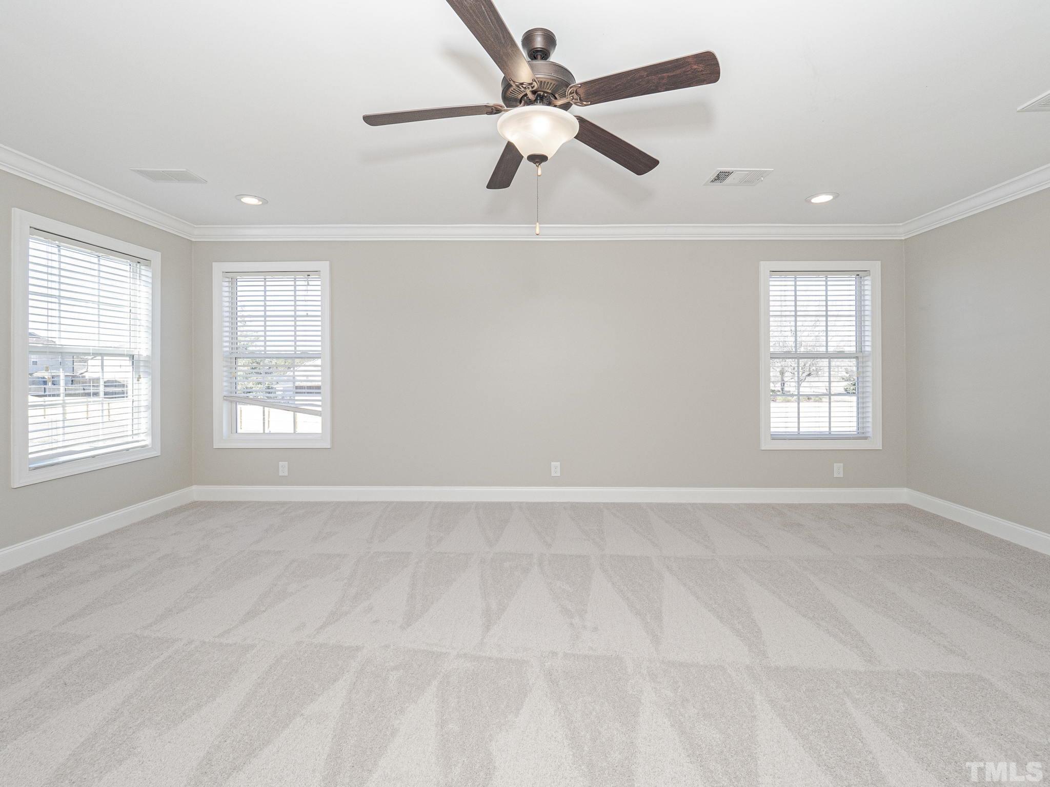 1213 Silver Farm Road Raleigh, NC 27603 - Photo 20 of 27 a view of an empty room with a window