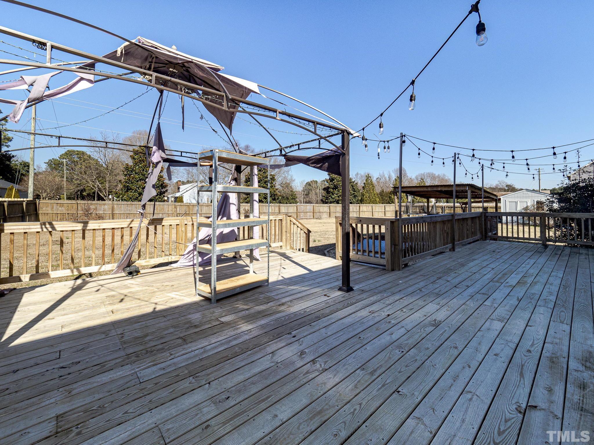 1213 Silver Farm Road Raleigh, NC 27603 - Photo 26 of 27 a view of a roof deck