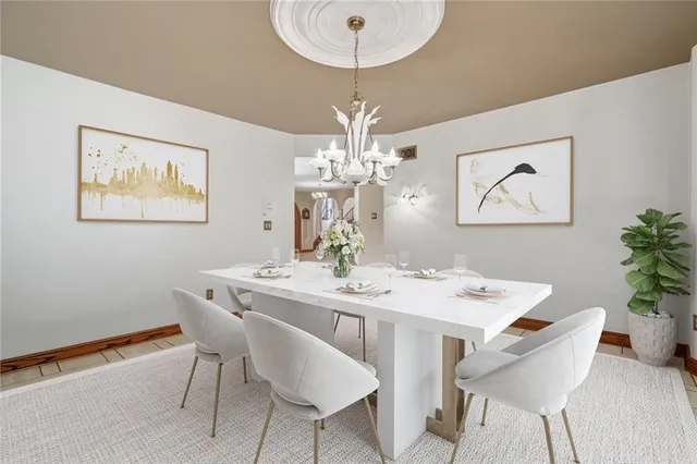 a bathroom with a granite countertop sink a large mirror and a shower