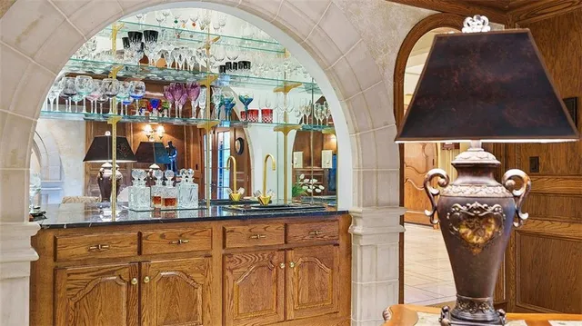 a bedroom with a bed and dresser