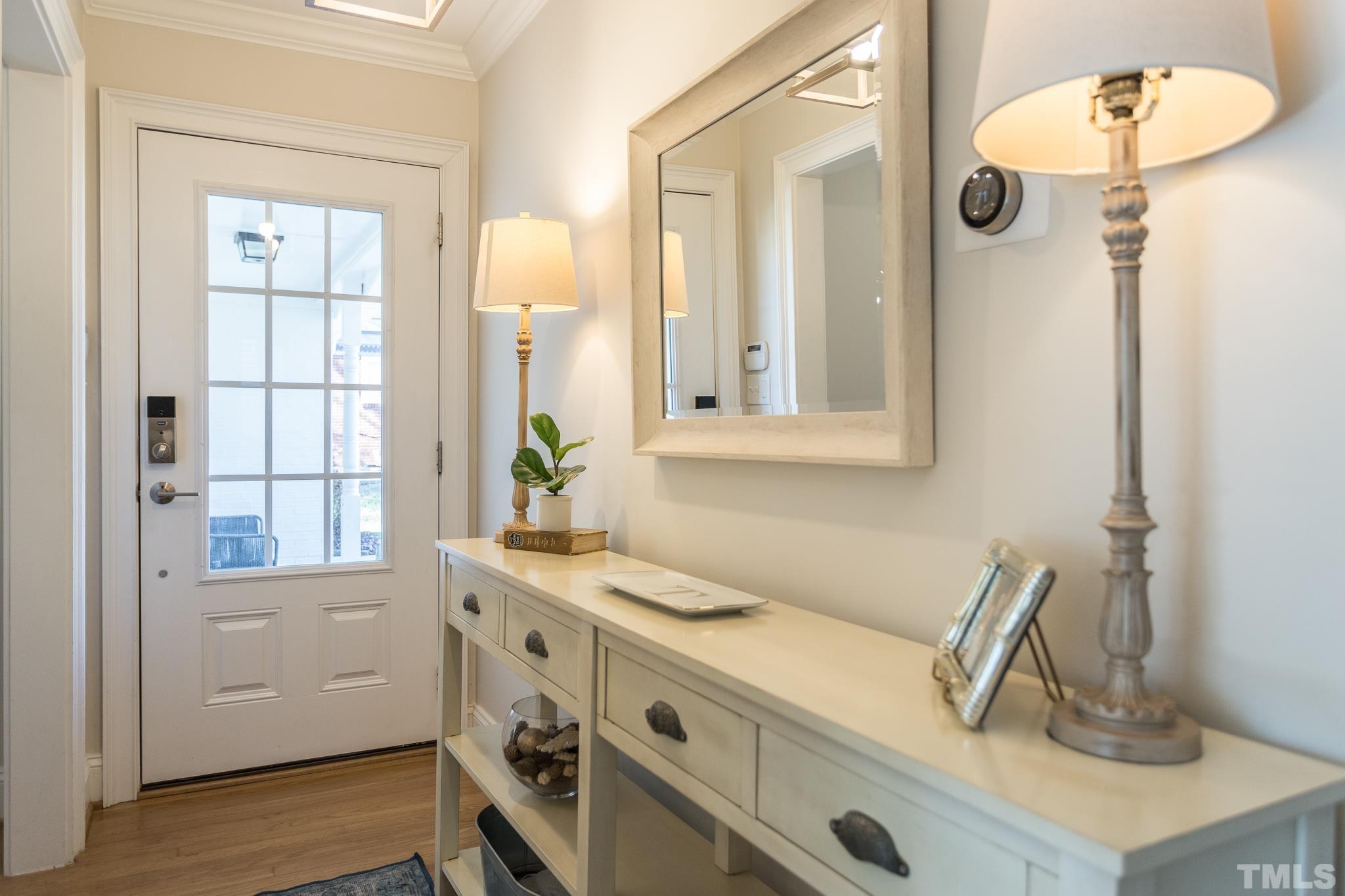 516 Harvard Street Raleigh, NC 27609 - Photo 5 of 31 a bathroom with a sink and a mirror