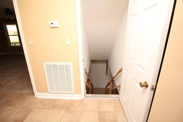 a view of an entryway with staircase