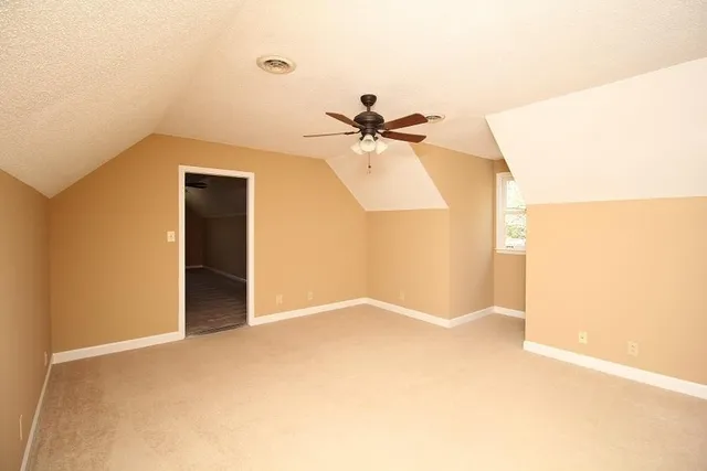 a view of a hallway with a chandelier
