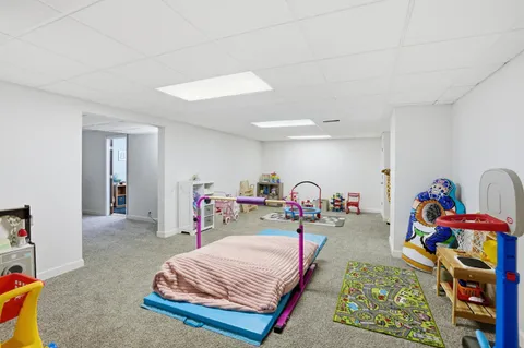 a bed room with a bed and a couch