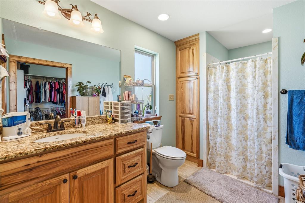 1111 Riley Road Whitesboro, TX 76273 - Photo 16 of 34 second living space bathroom