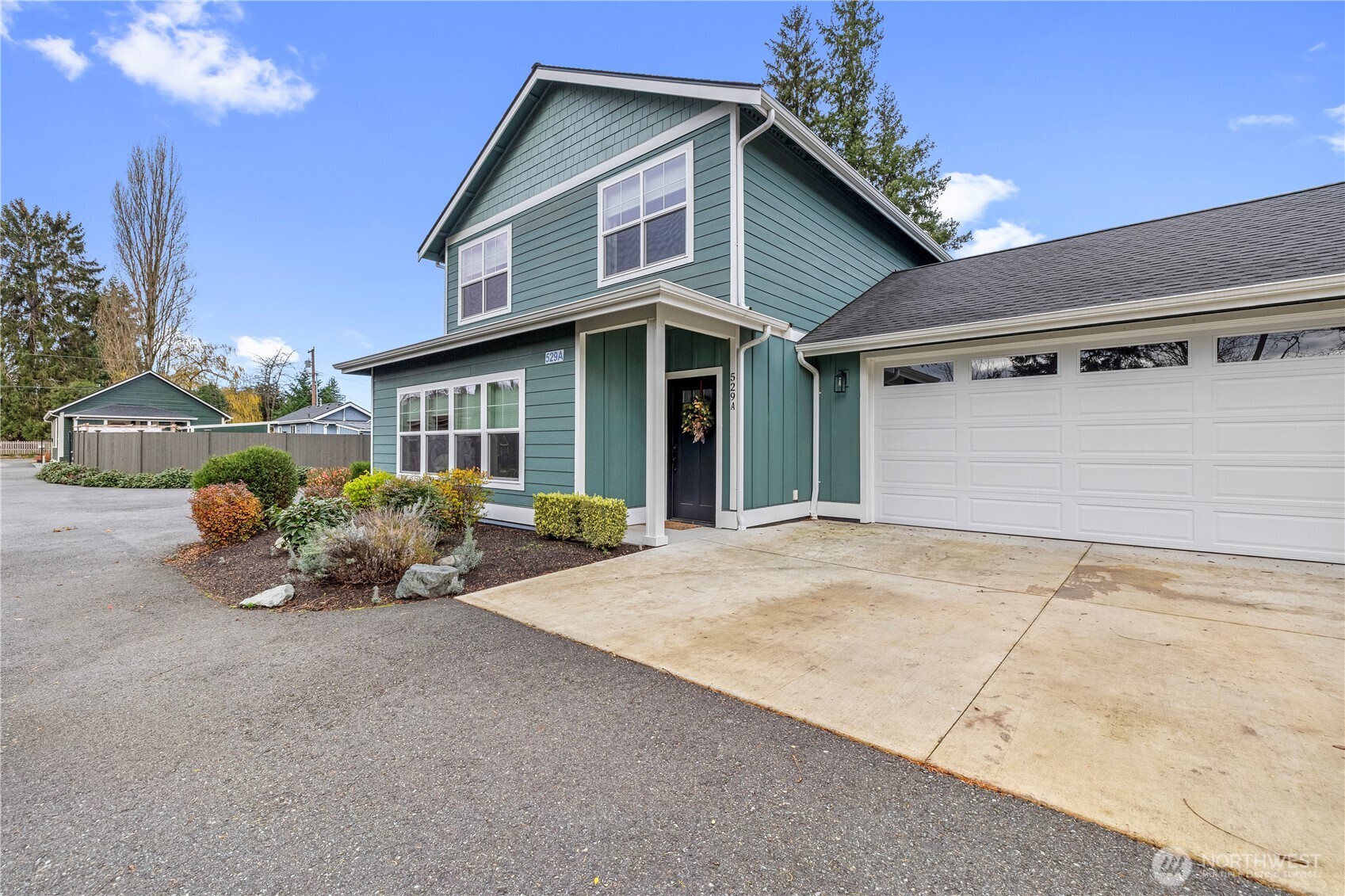 529 Ball Street, Unit A & B Sedro-Woolley, WA 98284 - Photo 2 of 31 a front view of a house with patio