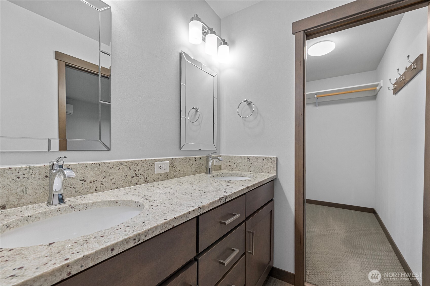 529 Ball Street, Unit A & B Sedro-Woolley, WA 98284 - Photo 23 of 31 a bathroom with a granite countertop sink and a mirror