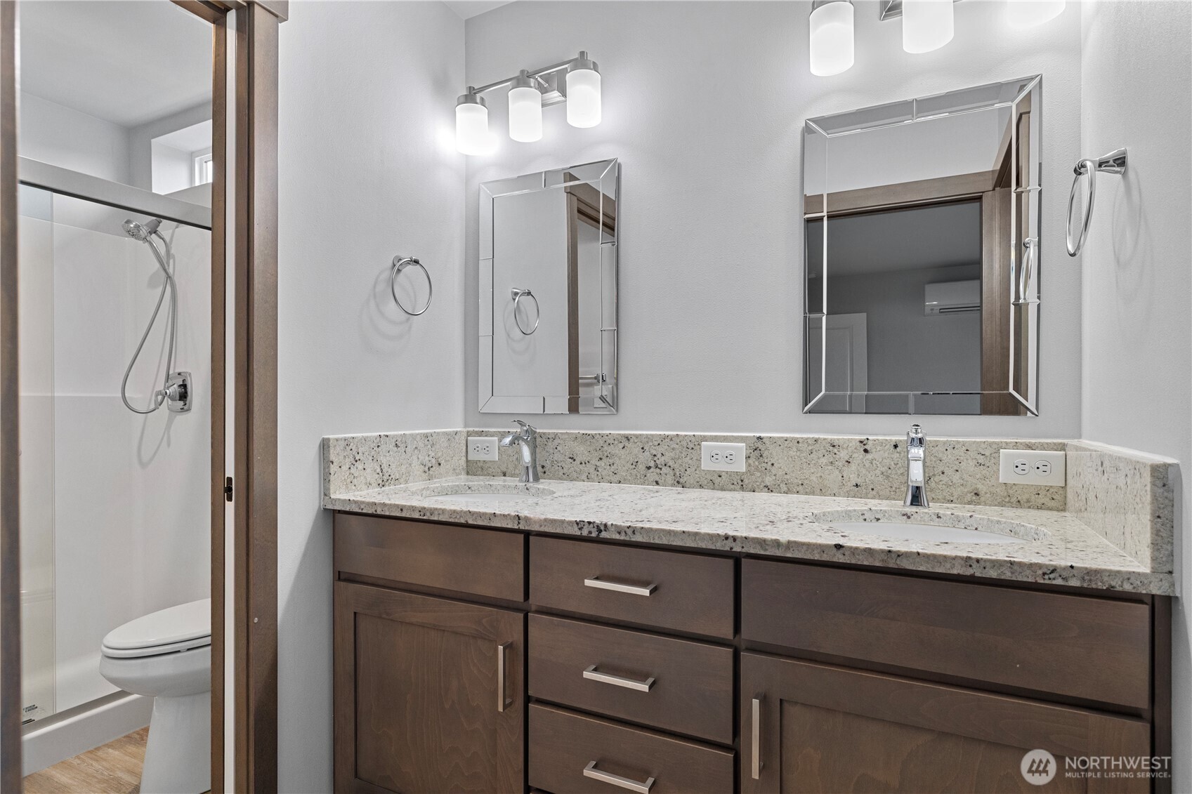 529 Ball Street, Unit A & B Sedro-Woolley, WA 98284 - Photo 24 of 31 a bathroom with a granite countertop sink toilet and mirror