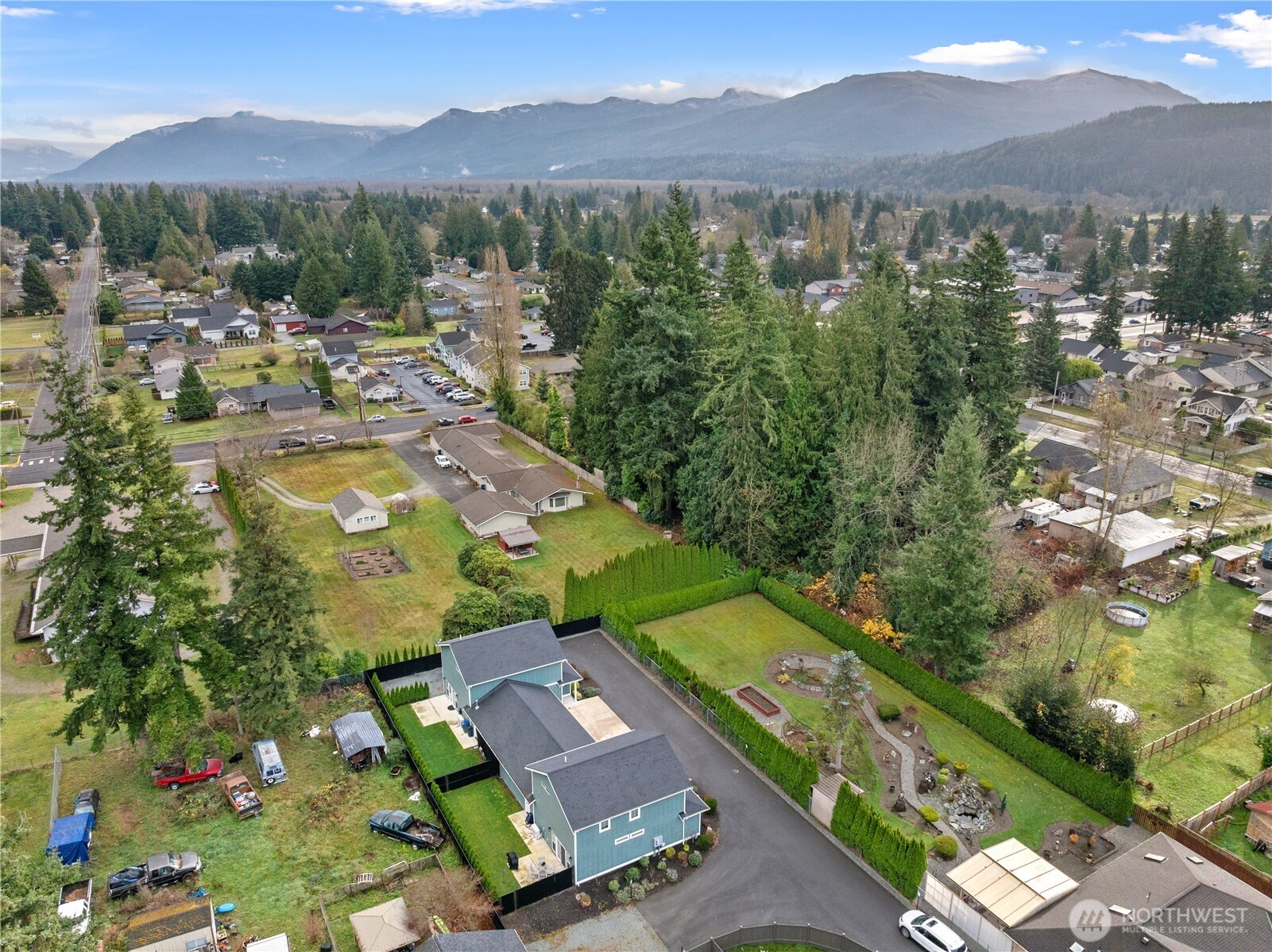 529 Ball Street, Unit A & B Sedro-Woolley, WA 98284 - Photo 31 of 31 an aerial view of residential houses with outdoor space