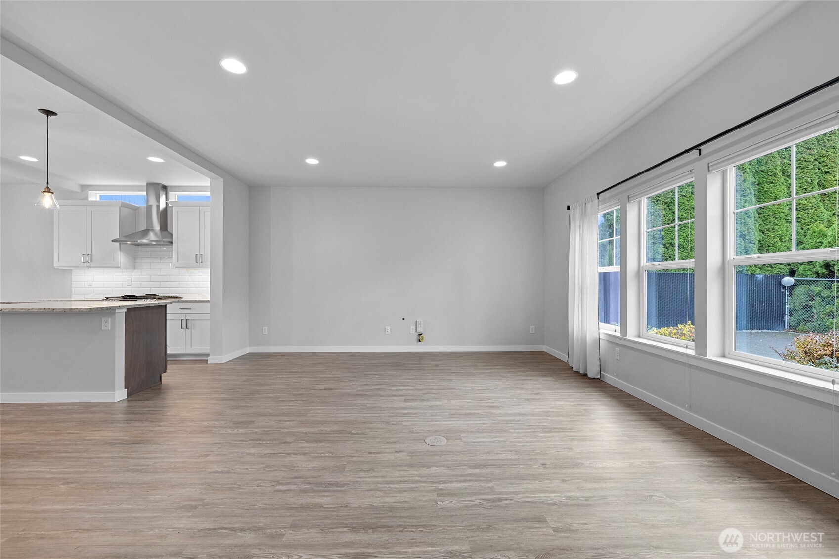 529 Ball Street, Unit A & B Sedro-Woolley, WA 98284 - Photo 5 of 31 a view of an empty room with a kitchen and window