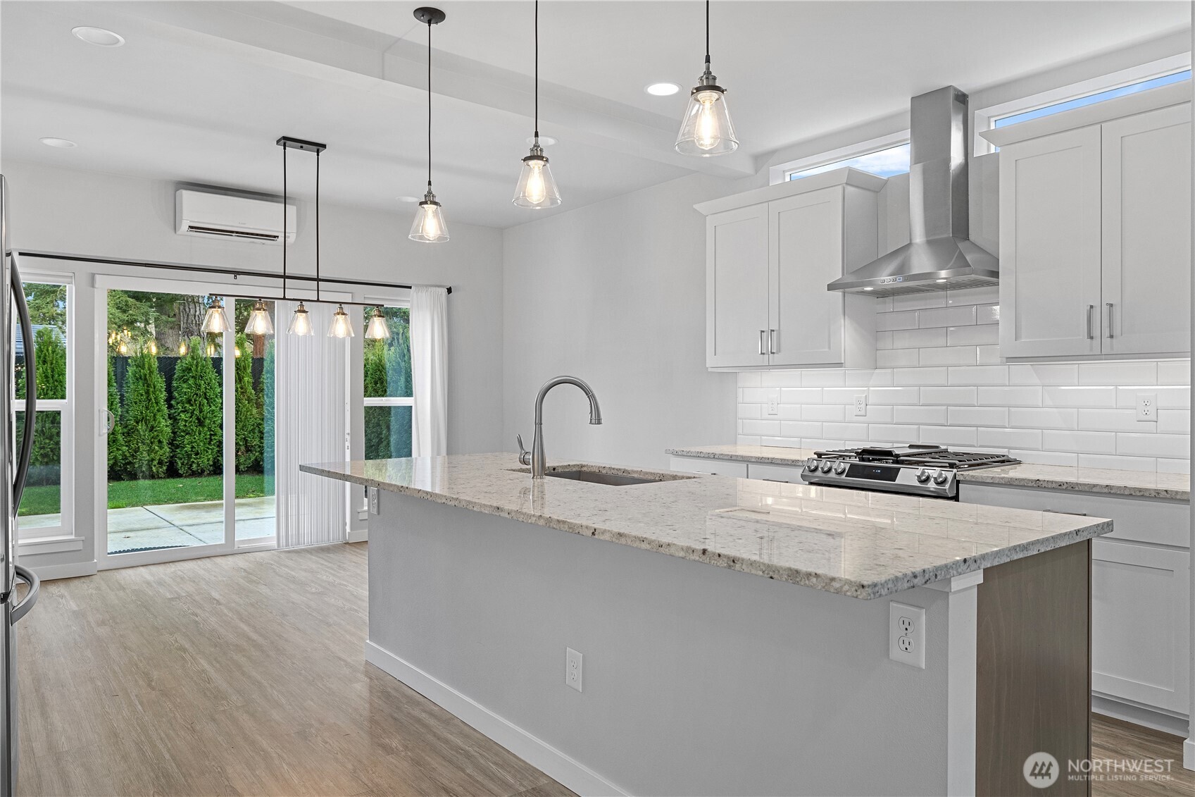 529 Ball Street, Unit A & B Sedro-Woolley, WA 98284 - Photo 10 of 31 a kitchen with kitchen island a sink stainless steel appliances and cabinets