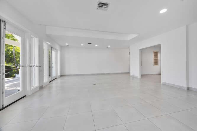 621 North Mashta Drive Key Biscayne, FL 33149 - Photo 6 of 34 a view of an empty room with a window