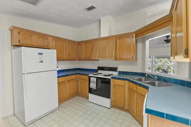 a view of cabinets and window