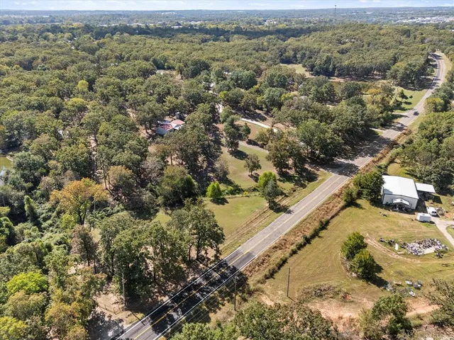a house with trees in front of it