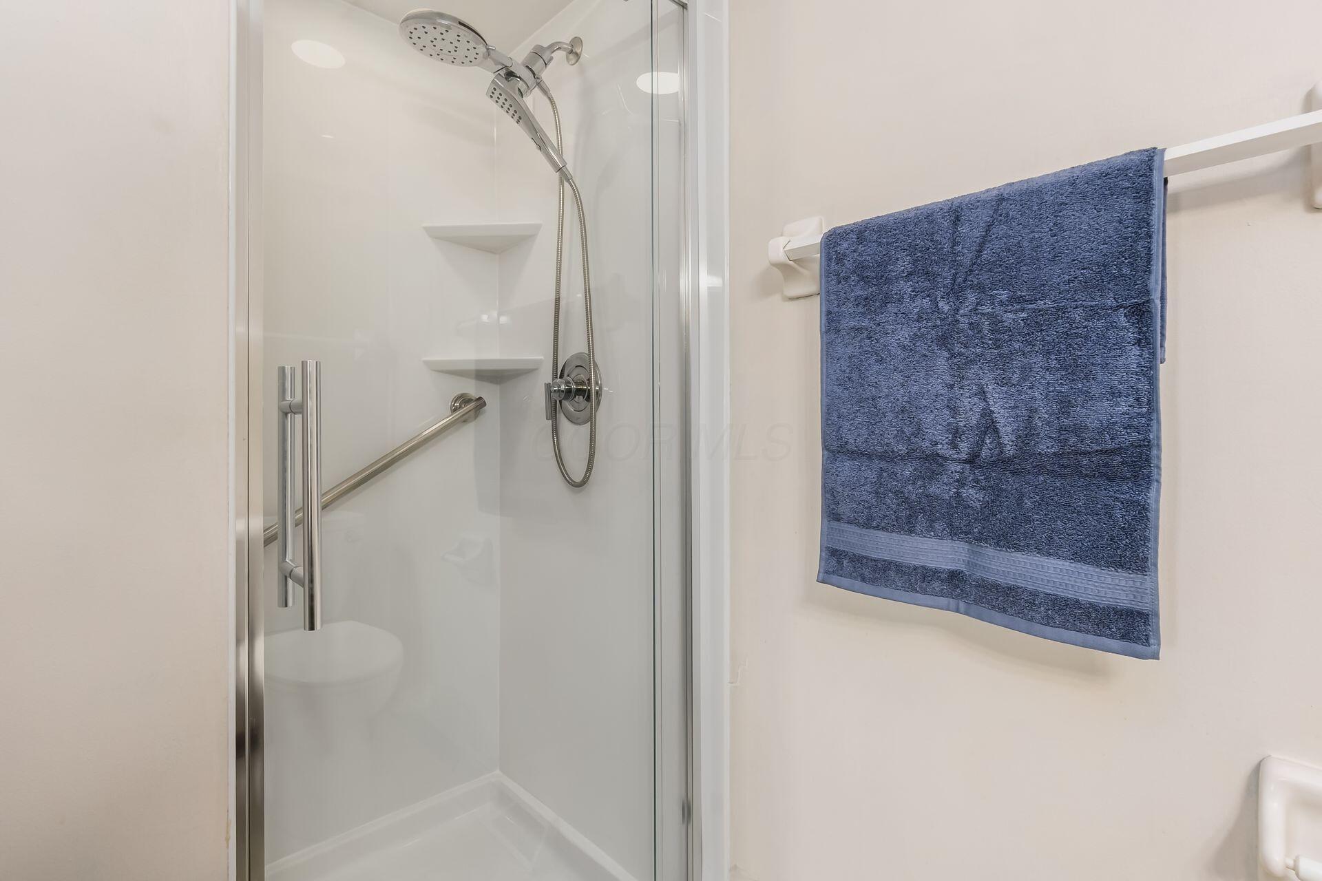 4765 Coach Road Columbus, OH 43220 - Photo 36 of 47 All new shower and flooring in guest bath