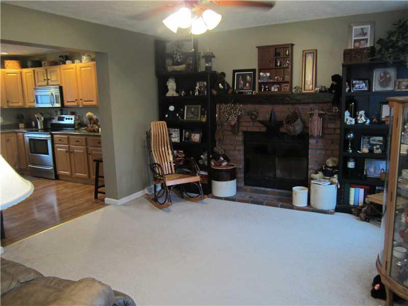 60 Walters Road Grove City, PA 16127 - Photo 2 of 25 Living Room. Woodburning fireplace in the Living Room for warm evenings with the family.