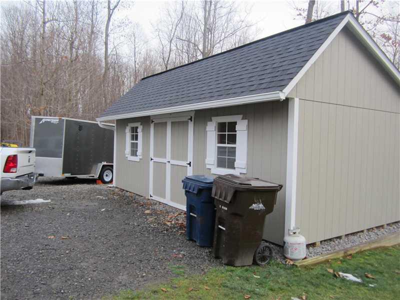 60 Walters Road Grove City, PA 16127 - Photo 23 of 25 Parking Lot/Garage. 24x14 Storage Shed and additional parking area beside it for trailer or extra cars.
