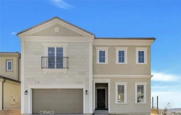 a front view of a house with windows