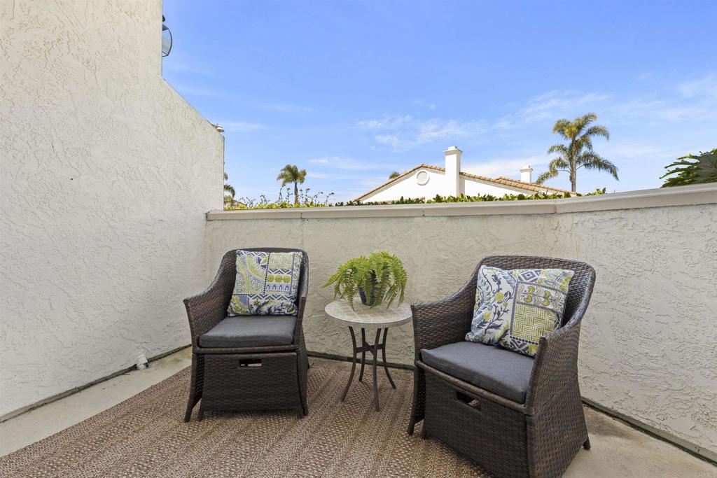 3305 Genoa Way, Unit 90 Oceanside, CA 92056 - Photo 17 of 35 a view of a chairs in a living room