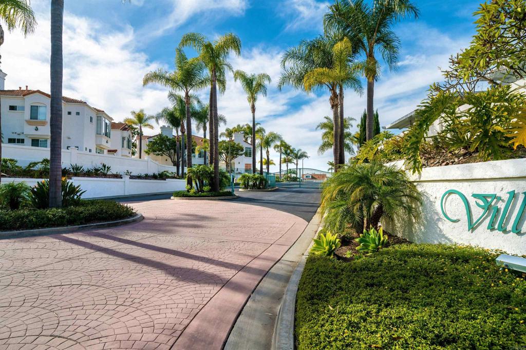 3305 Genoa Way, Unit 90 Oceanside, CA 92056 - Photo 28 of 35 a sign that is on the side of a road