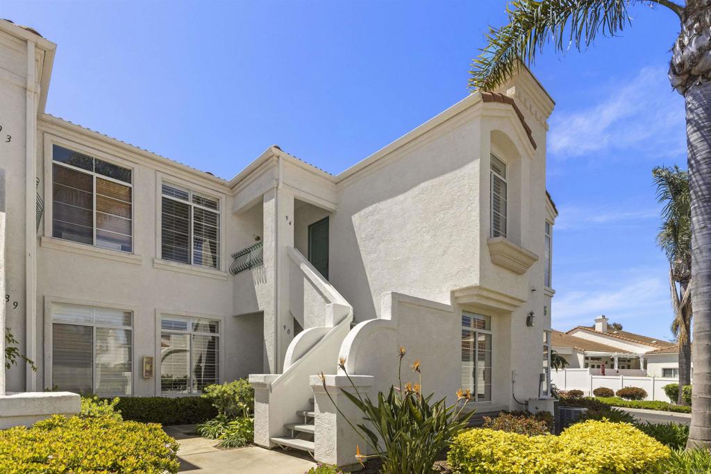 3305 Genoa Way, Unit 90 Oceanside, CA 92056 - Photo 3 of 35 a view of a building with a street