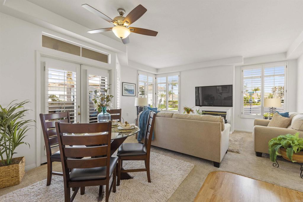3305 Genoa Way, Unit 90 Oceanside, CA 92056 - Photo 10 of 35 a view of a dining room with furniture window and outside view
