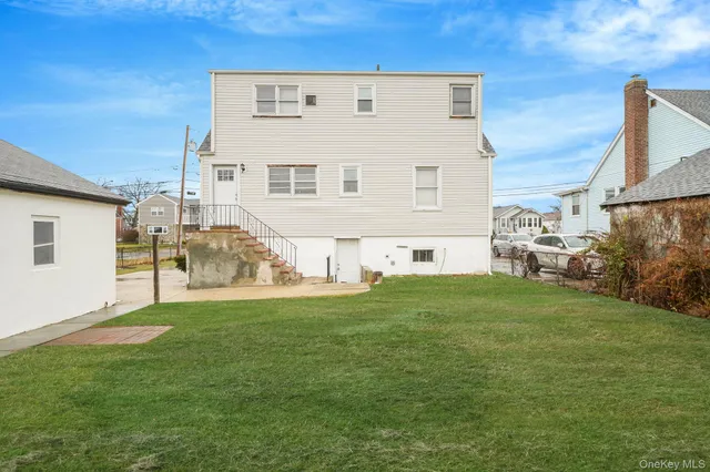 a view of a backyard of the house