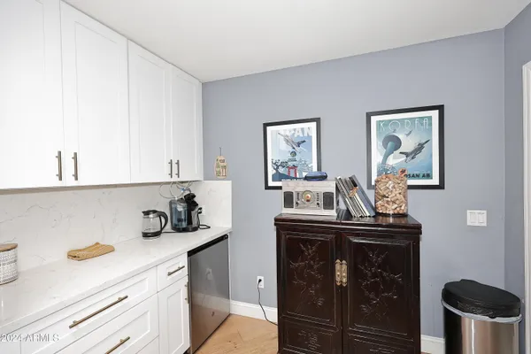 a view of livingroom with washer and dryer
