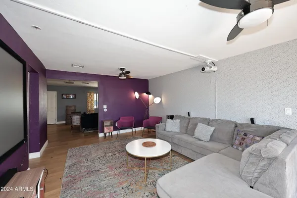 a bathroom with a sink vanity and a mirror