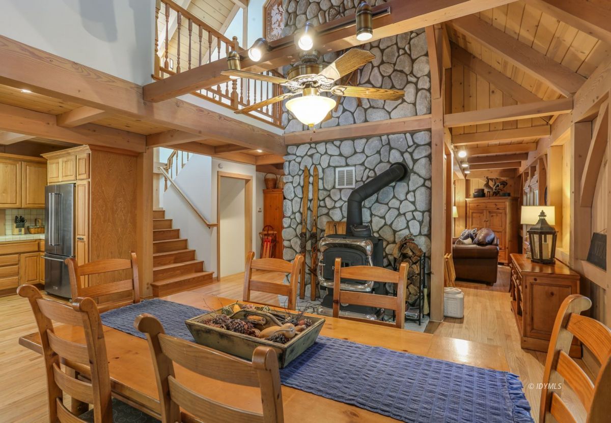 25905 Wayne Road Idyllwild, CA 92549 - Photo 8 of 47 a bedroom with furniture and a chandelier