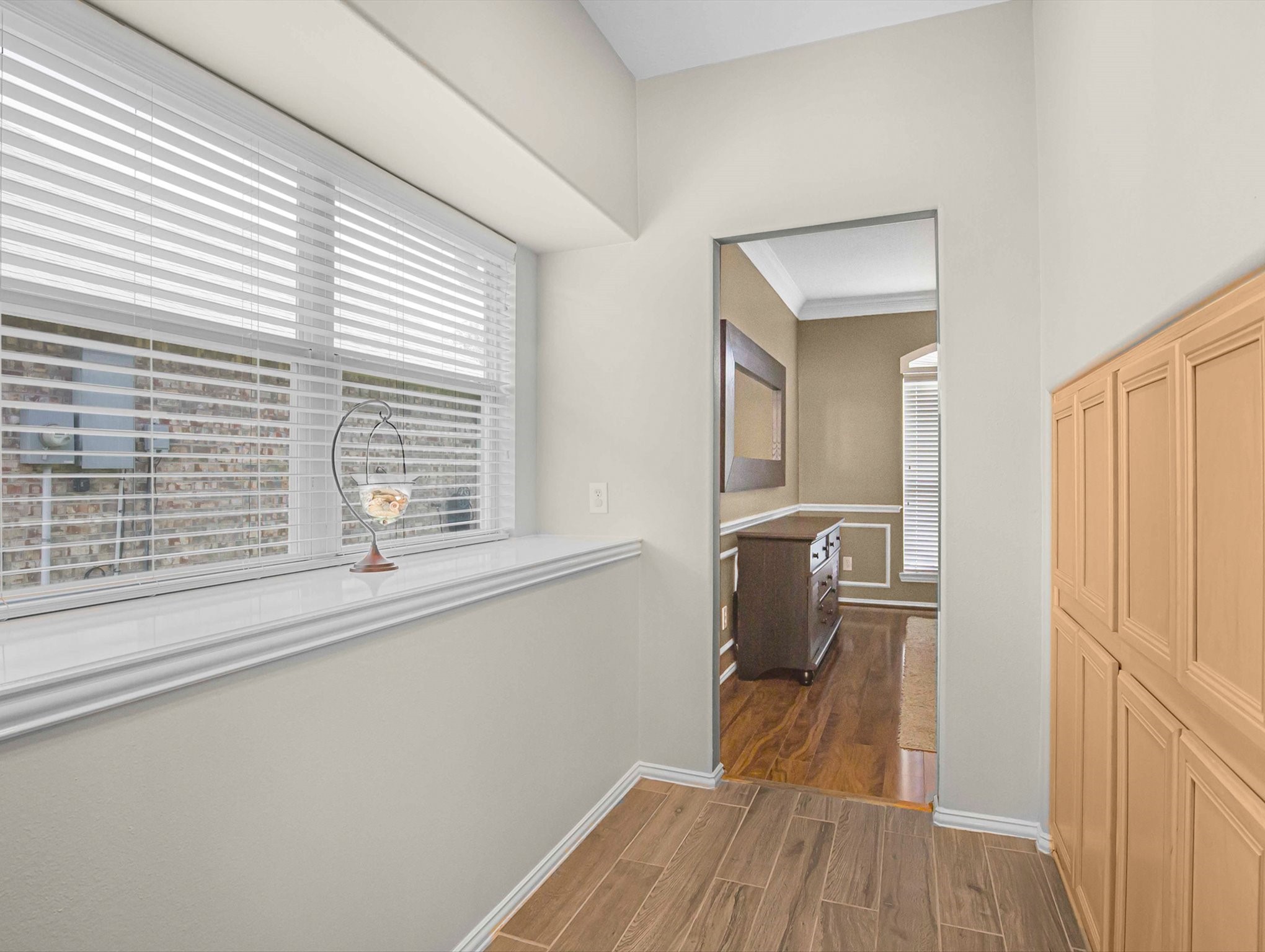 21402 Hannover Forest Spring, TX 77388 - Photo 15 of 30 a view of hallway with a large window and wooden floor