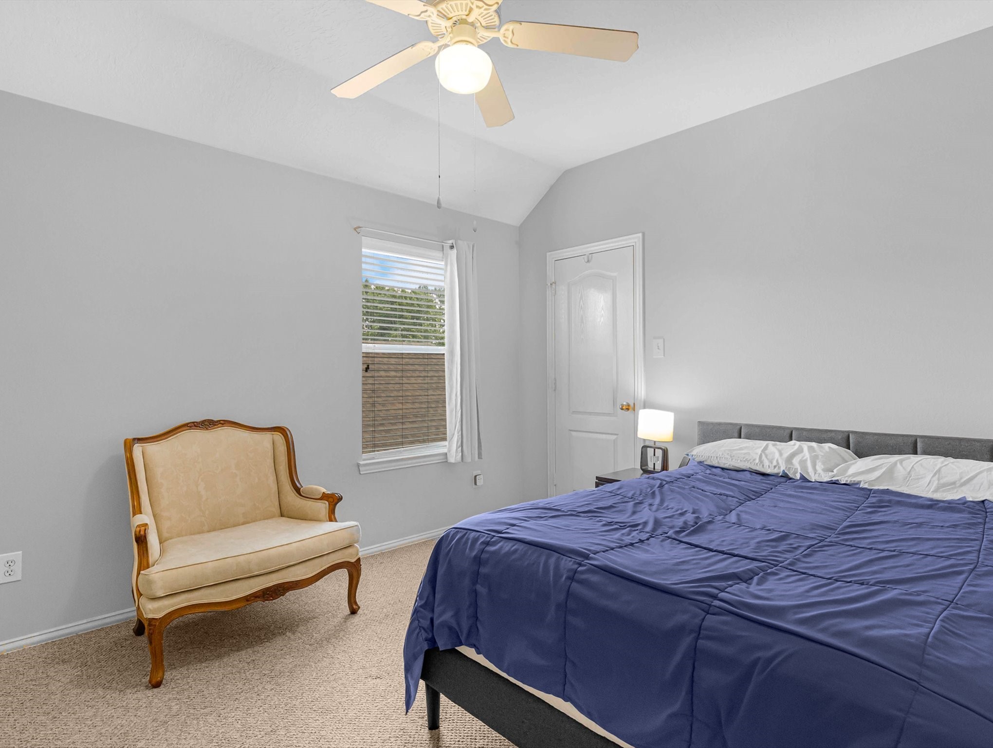 21402 Hannover Forest Spring, TX 77388 - Photo 25 of 30 a bedroom with a bed and a chair