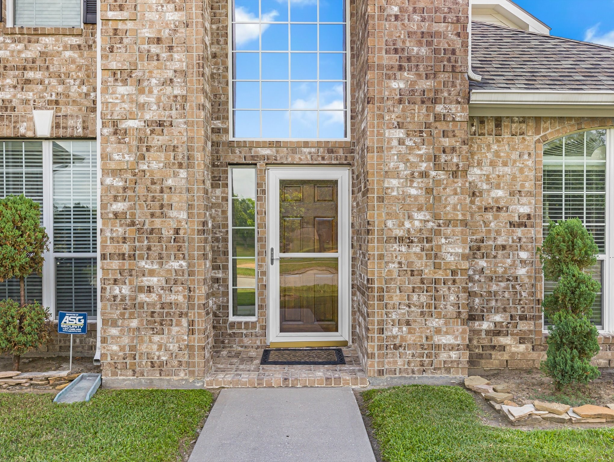 21402 Hannover Forest Spring, TX 77388 - Photo 4 of 30 a front view of a house with a yard