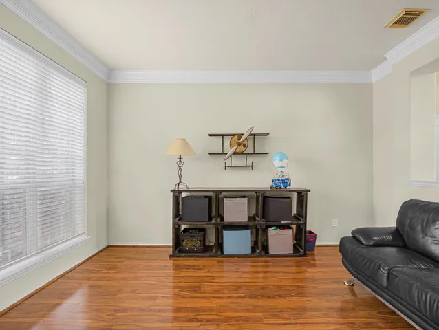 a view of a livingroom with furniture and window