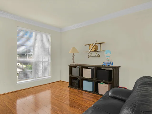 a view of a livingroom with furniture and window