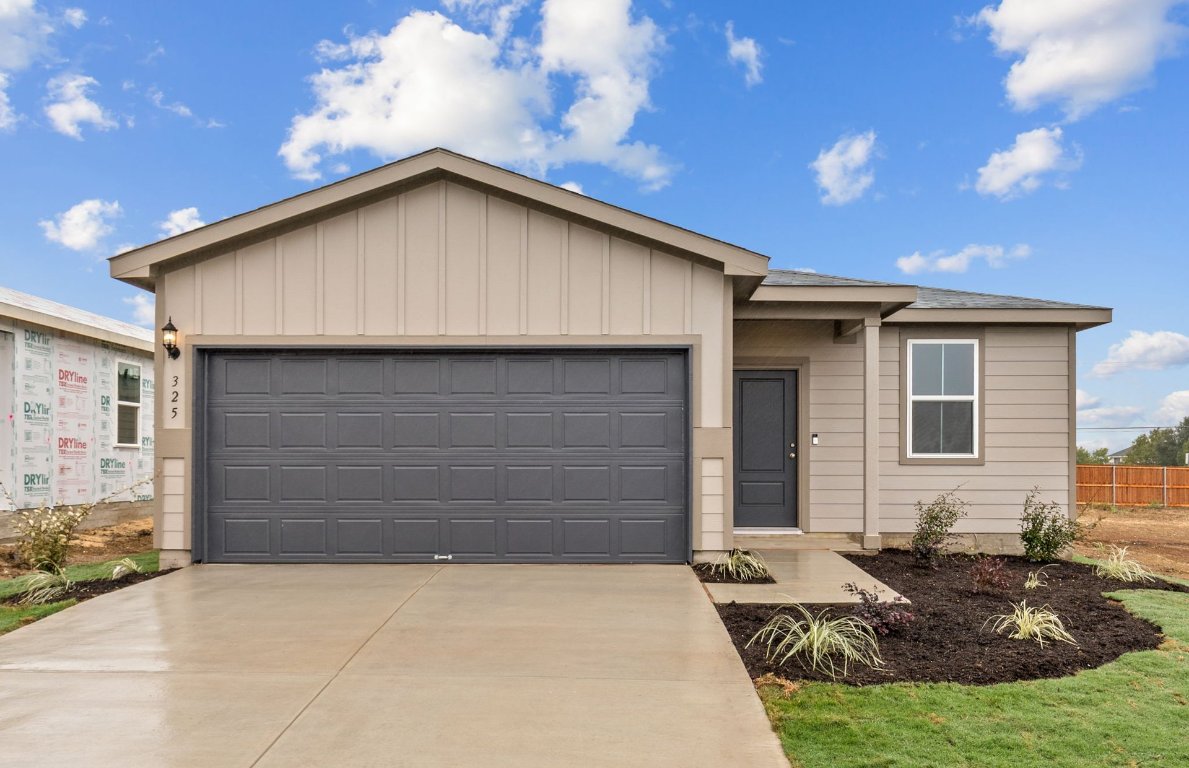 a backyard of a house with seating space