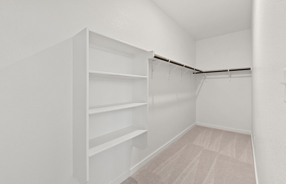 325 Sullivan Way Elgin, TX 78621 - Photo 11 of 19 a view of an empty walk in closet