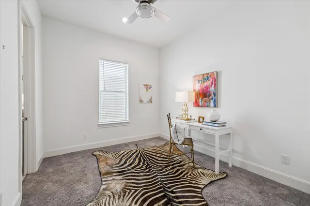 a bathroom with a double vanity sink toilet mirror and shower