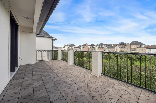 a living room with patio furniture
