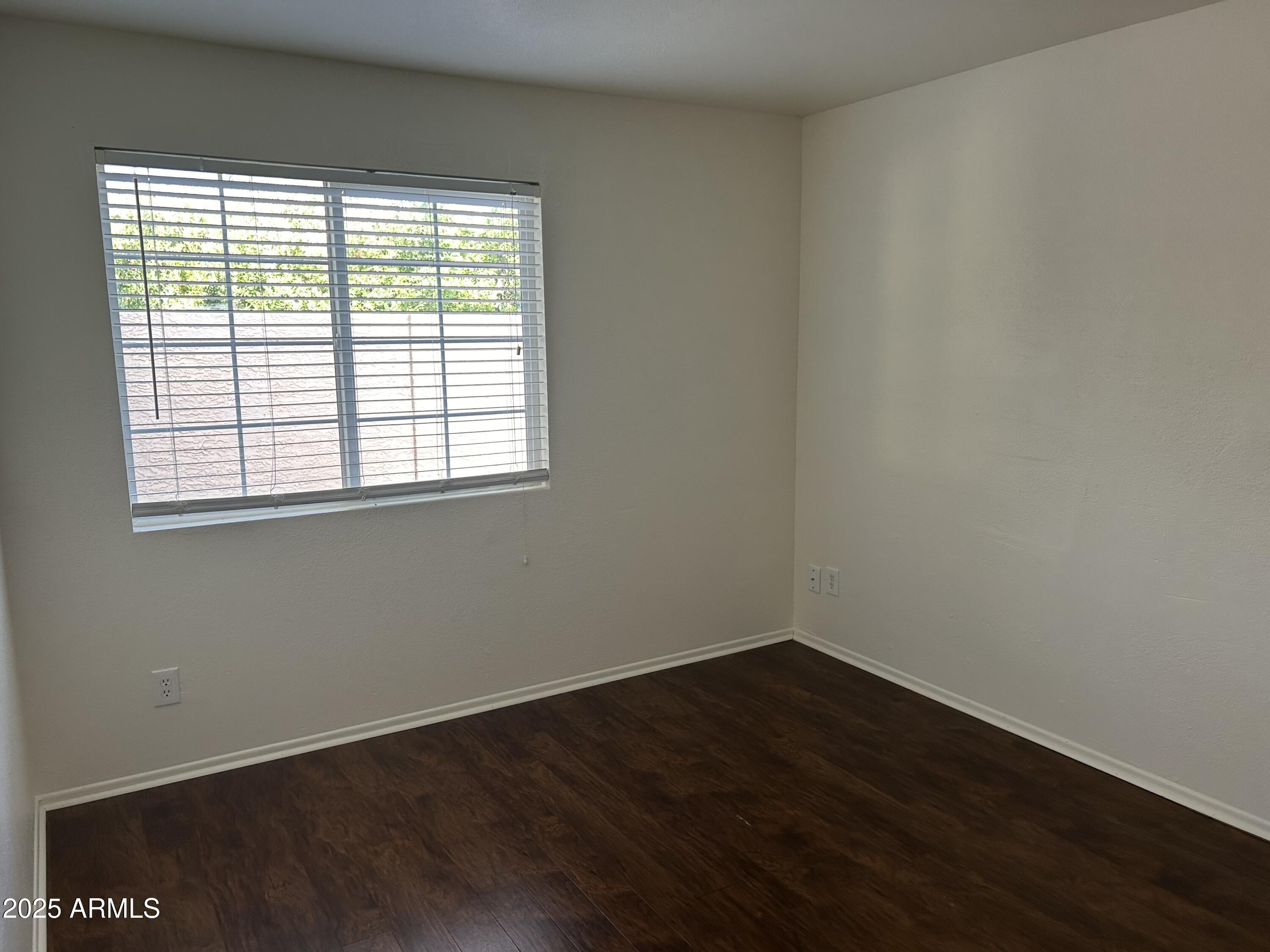 45 North Phyllis, Unit 109 Mesa, AZ 85201 - Photo 21 of 28 a view of a small space with wooden floor and a window