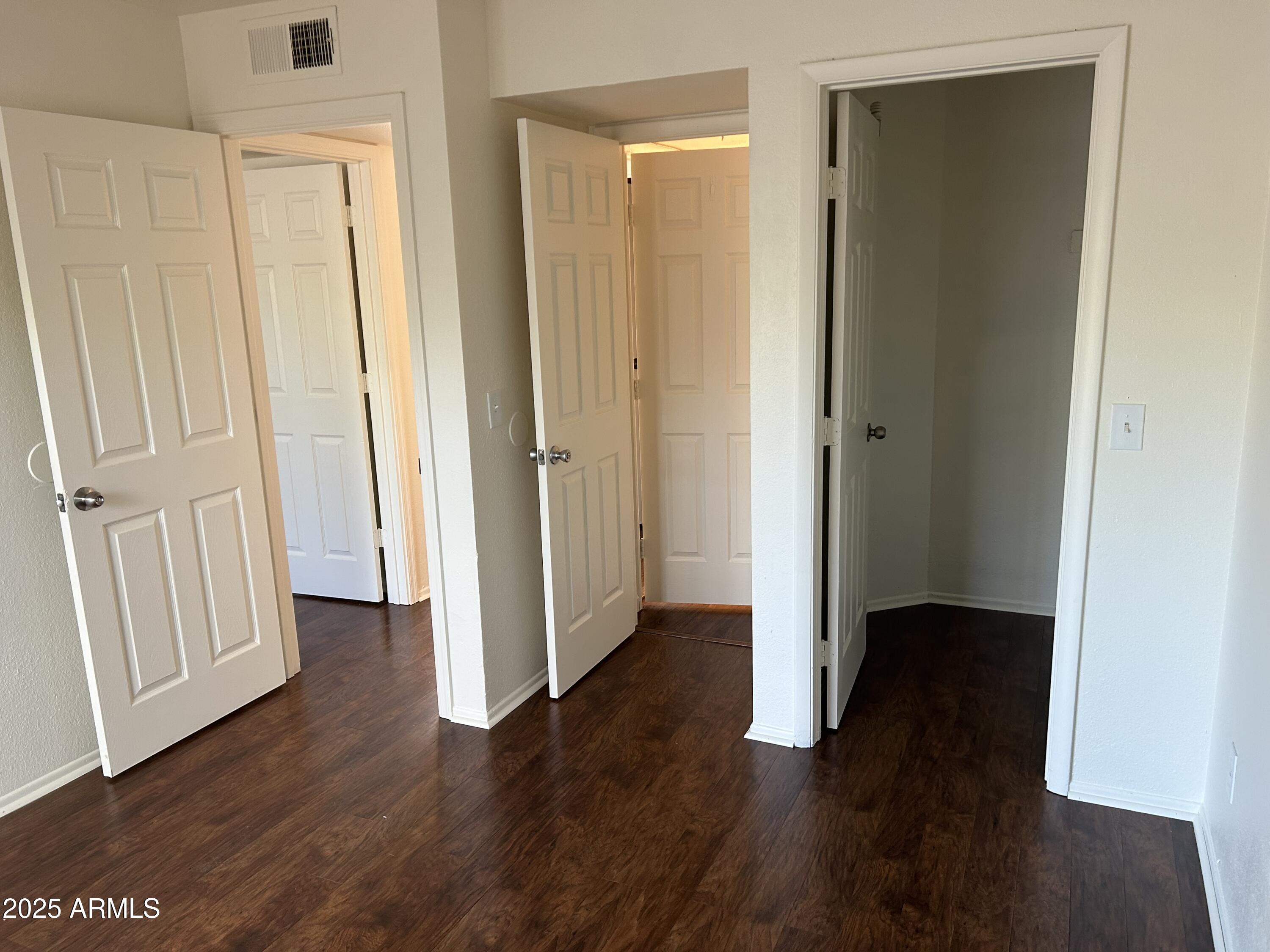 45 North Phyllis, Unit 109 Mesa, AZ 85201 - Photo 26 of 28 a view of a hallway with wooden floor