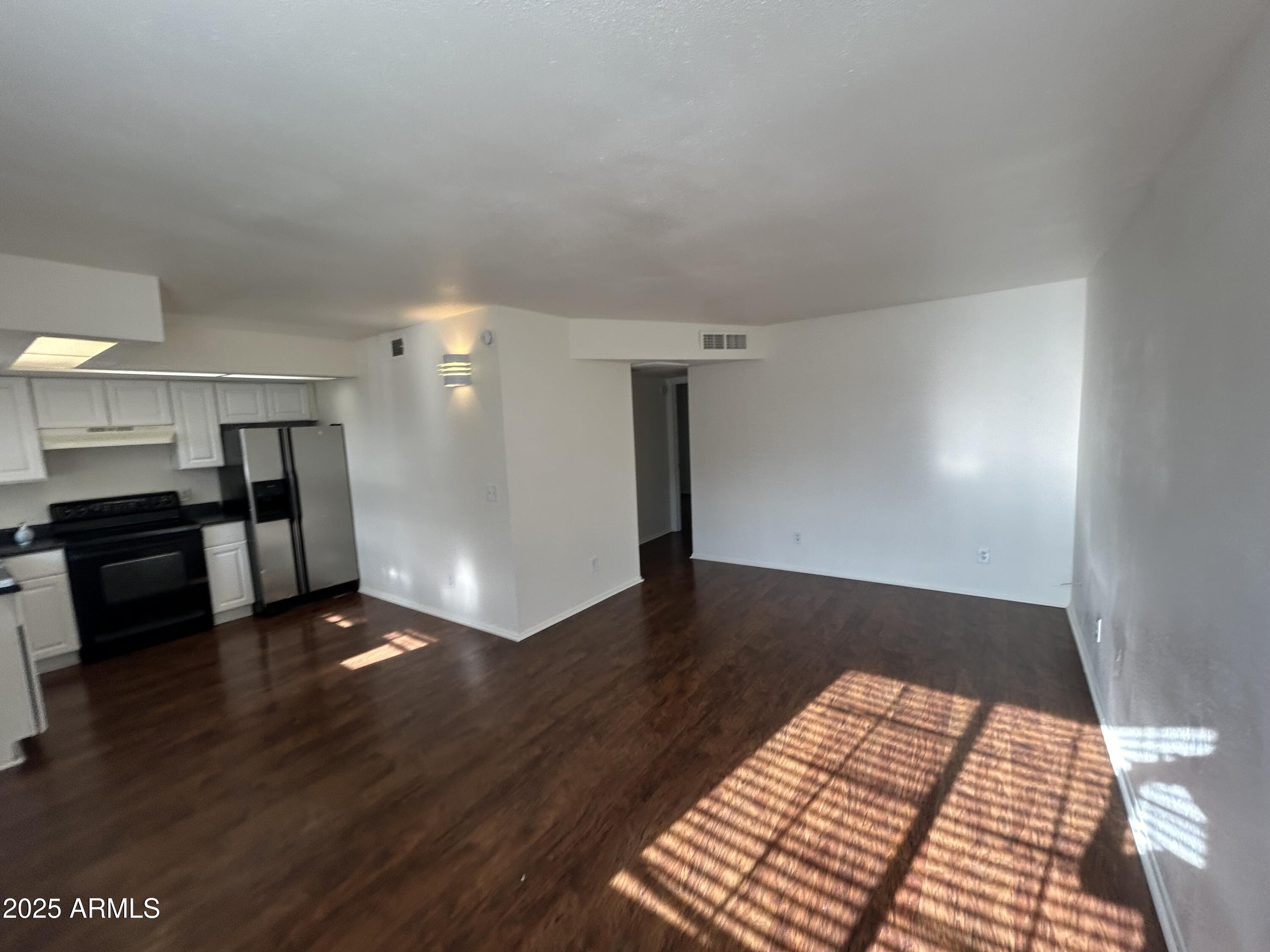 45 North Phyllis, Unit 109 Mesa, AZ 85201 - Photo 4 of 28 a view of a livingroom with wooden floor