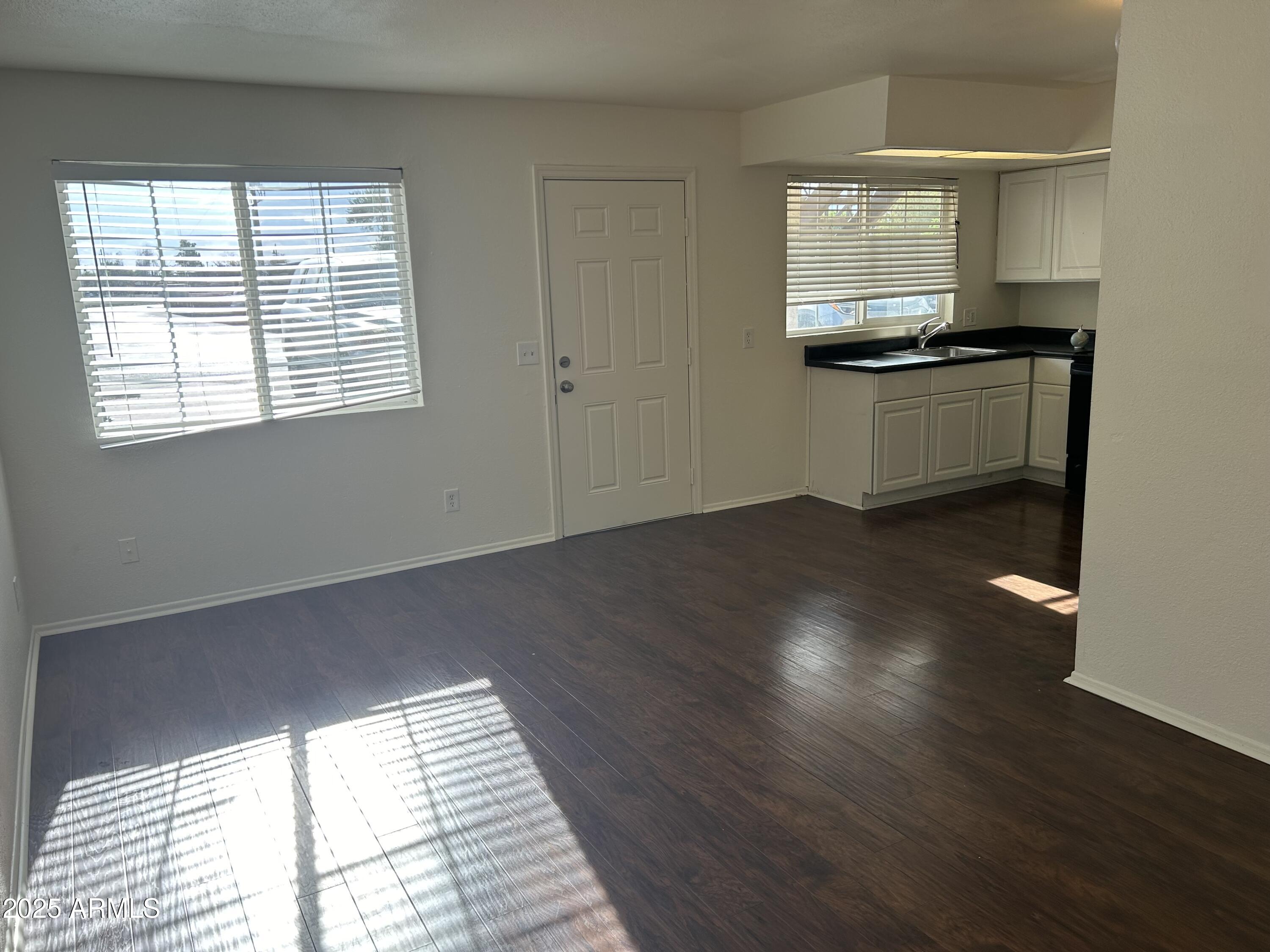 45 North Phyllis, Unit 109 Mesa, AZ 85201 - Photo 8 of 28 a kitchen with a sink and a window