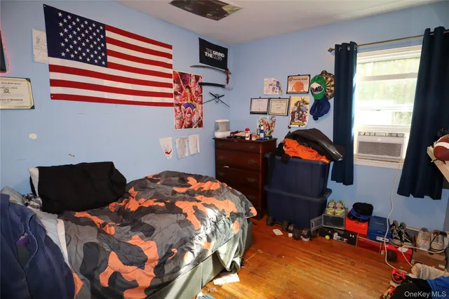 a bedroom with furniture and a bed