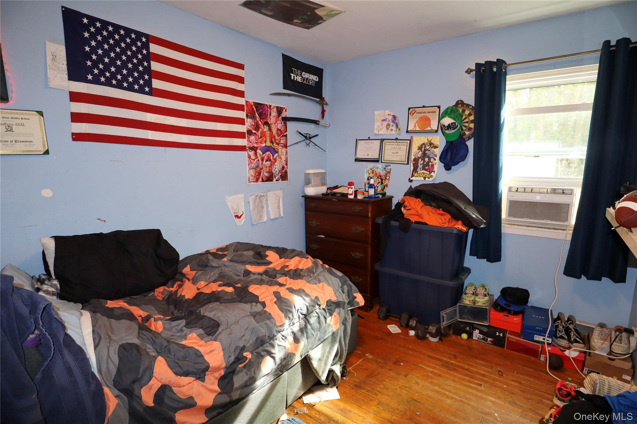 143 Jefferson Avenue Wyandanch, NY 11704 - Photo 15 of 37 a bedroom with two beds and a window