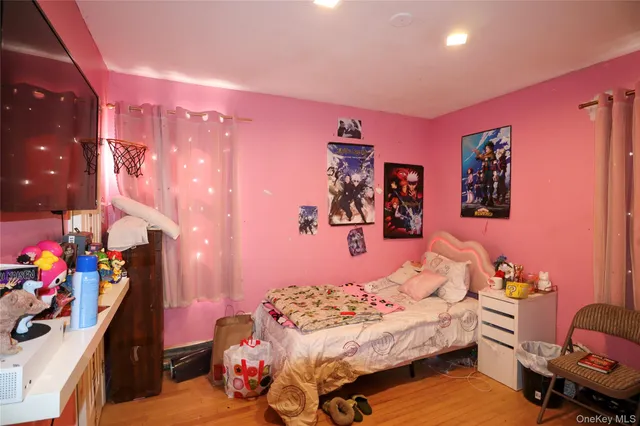 a bedroom with furniture and a bed