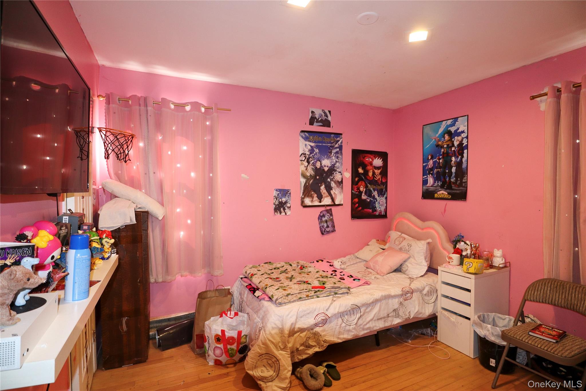 143 Jefferson Avenue Wyandanch, NY 11704 - Photo 16 of 37 a bedroom with furniture and a bed